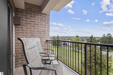 Absolutely stunning 1BR with views of East Bay from main living on  in Michigan - for sale on GolfHomes.com, golf home, golf lot