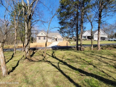 Build your dream home on this beautiful and level, nearly 1/2 on Tellico Village -The Links At Kahite Golf Course in Tennessee - for sale on GolfHomes.com, golf home, golf lot