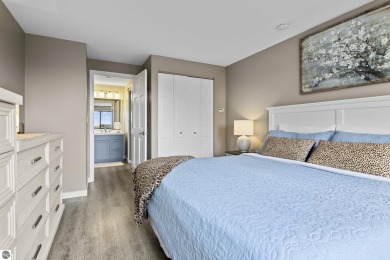 Absolutely stunning 1BR with views of East Bay from main living on  in Michigan - for sale on GolfHomes.com, golf home, golf lot