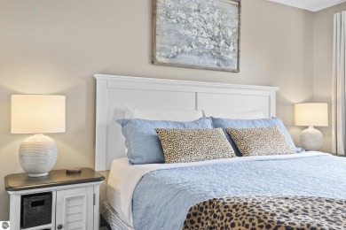 Absolutely stunning 1BR with views of East Bay from main living on  in Michigan - for sale on GolfHomes.com, golf home, golf lot