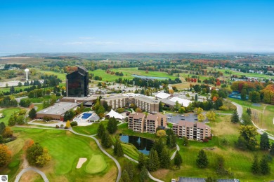 Absolutely stunning 1BR with views of East Bay from main living on  in Michigan - for sale on GolfHomes.com, golf home, golf lot