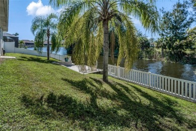 Welcome to this stunning waterfront residence in Cape Coral on Palmetto-Pine Country Club in Florida - for sale on GolfHomes.com, golf home, golf lot