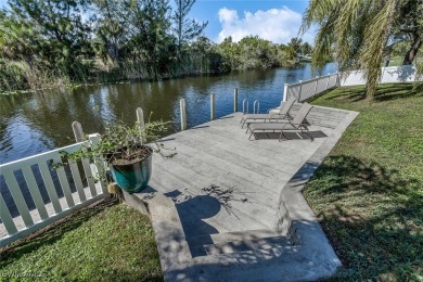 Welcome to this stunning waterfront residence in Cape Coral on Palmetto-Pine Country Club in Florida - for sale on GolfHomes.com, golf home, golf lot