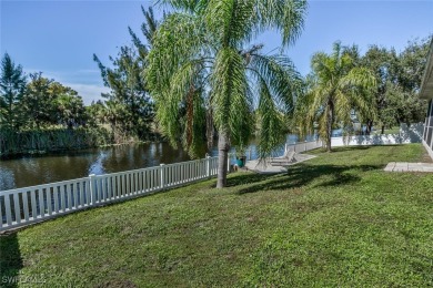 Welcome to this stunning waterfront residence in Cape Coral on Palmetto-Pine Country Club in Florida - for sale on GolfHomes.com, golf home, golf lot