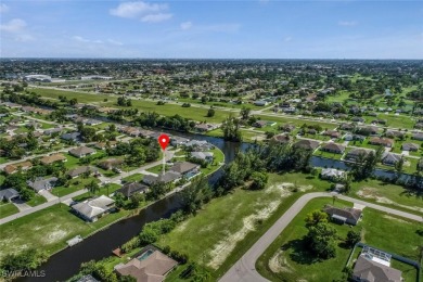 Welcome to this stunning waterfront residence in Cape Coral on Palmetto-Pine Country Club in Florida - for sale on GolfHomes.com, golf home, golf lot