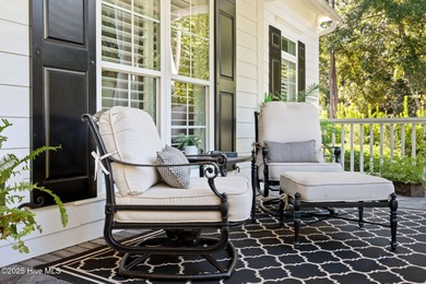 This exceptional home blends timeless Southern charm with on Lockwood Folly Country Club in North Carolina - for sale on GolfHomes.com, golf home, golf lot