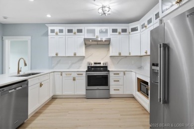 This beautifully updated 3 bed, 2 bath end unit in the quiet on The Club At Old Kinderhook in Missouri - for sale on GolfHomes.com, golf home, golf lot