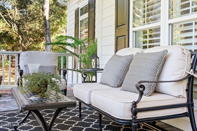 This exceptional home blends timeless Southern charm with on Lockwood Folly Country Club in North Carolina - for sale on GolfHomes.com, golf home, golf lot