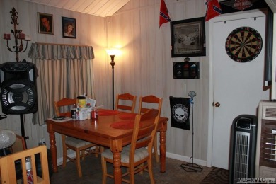 Check out this fully furnished 1994 camper with addition built on River Ridge Golf Club in Virginia - for sale on GolfHomes.com, golf home, golf lot