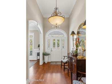This exceptional home blends timeless Southern charm with on Lockwood Folly Country Club in North Carolina - for sale on GolfHomes.com, golf home, golf lot