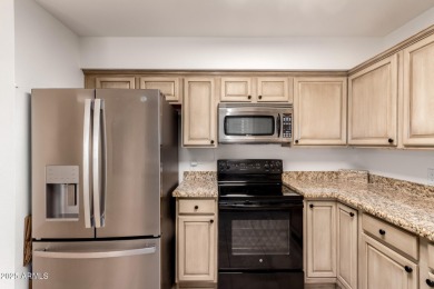Welcome to this delightful 2-bedroom townhome with a roomy 2-car on Westbrook Village Golf Club in Arizona - for sale on GolfHomes.com, golf home, golf lot