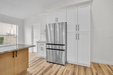 Welcome to this beautifully updated home in the sought-after on Kings Ridge Golf Club in Florida - for sale on GolfHomes.com, golf home, golf lot