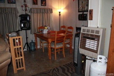 Check out this fully furnished 1994 camper with addition built on River Ridge Golf Club in Virginia - for sale on GolfHomes.com, golf home, golf lot