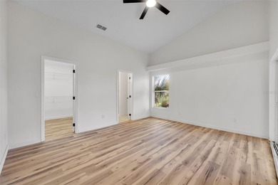 Welcome to this beautifully updated home in the sought-after on Kings Ridge Golf Club in Florida - for sale on GolfHomes.com, golf home, golf lot