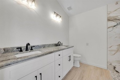 Welcome to this beautifully updated home in the sought-after on Kings Ridge Golf Club in Florida - for sale on GolfHomes.com, golf home, golf lot