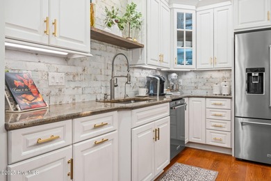 This exceptional home blends timeless Southern charm with on Lockwood Folly Country Club in North Carolina - for sale on GolfHomes.com, golf home, golf lot