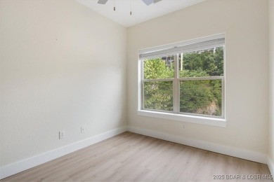 This beautifully updated 3 bed, 2 bath end unit in the quiet on The Club At Old Kinderhook in Missouri - for sale on GolfHomes.com, golf home, golf lot
