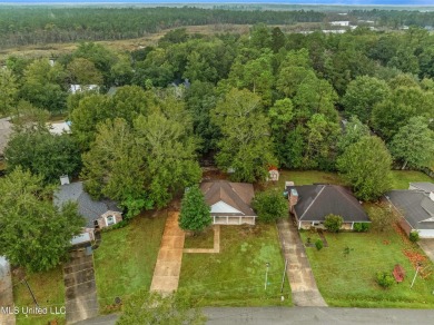 This charming 3-bedroom, 2-bathroom home is a perfect starter on Mississippi National Golf Course in Mississippi - for sale on GolfHomes.com, golf home, golf lot