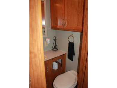Check out this fully furnished 1994 camper with addition built on River Ridge Golf Club in Virginia - for sale on GolfHomes.com, golf home, golf lot