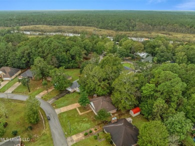 This charming 3-bedroom, 2-bathroom home is a perfect starter on Mississippi National Golf Course in Mississippi - for sale on GolfHomes.com, golf home, golf lot