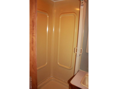 Check out this fully furnished 1994 camper with addition built on River Ridge Golf Club in Virginia - for sale on GolfHomes.com, golf home, golf lot