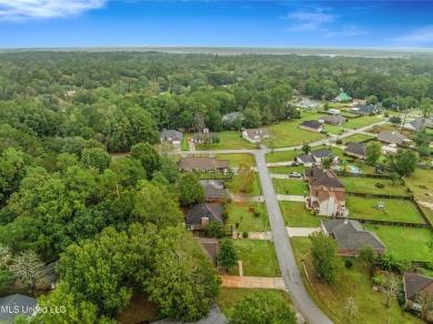 This charming 3-bedroom, 2-bathroom home is a perfect starter on Mississippi National Golf Course in Mississippi - for sale on GolfHomes.com, golf home, golf lot