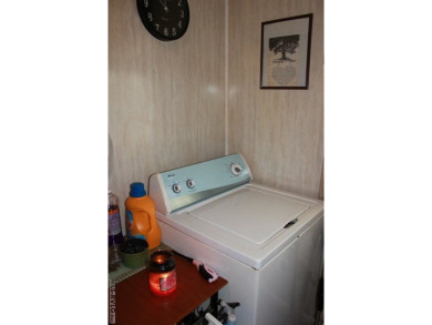 Check out this fully furnished 1994 camper with addition built on River Ridge Golf Club in Virginia - for sale on GolfHomes.com, golf home, golf lot