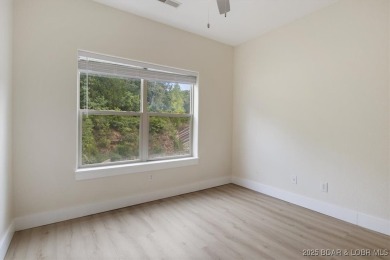 This beautifully updated 3 bed, 2 bath end unit in the quiet on The Club At Old Kinderhook in Missouri - for sale on GolfHomes.com, golf home, golf lot