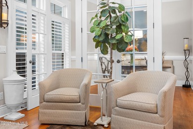 This exceptional home blends timeless Southern charm with on Lockwood Folly Country Club in North Carolina - for sale on GolfHomes.com, golf home, golf lot