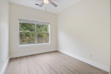 This beautifully updated 3 bed, 2 bath end unit in the quiet on The Club At Old Kinderhook in Missouri - for sale on GolfHomes.com, golf home, golf lot