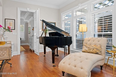 This exceptional home blends timeless Southern charm with on Lockwood Folly Country Club in North Carolina - for sale on GolfHomes.com, golf home, golf lot