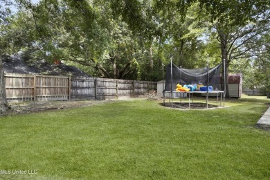 This charming 3-bedroom, 2-bathroom home is a perfect starter on Mississippi National Golf Course in Mississippi - for sale on GolfHomes.com, golf home, golf lot