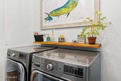 This exceptional home blends timeless Southern charm with on Lockwood Folly Country Club in North Carolina - for sale on GolfHomes.com, golf home, golf lot