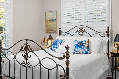 This exceptional home blends timeless Southern charm with on Lockwood Folly Country Club in North Carolina - for sale on GolfHomes.com, golf home, golf lot