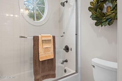 This exceptional home blends timeless Southern charm with on Lockwood Folly Country Club in North Carolina - for sale on GolfHomes.com, golf home, golf lot