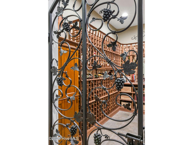 This exceptional home blends timeless Southern charm with on Lockwood Folly Country Club in North Carolina - for sale on GolfHomes.com, golf home, golf lot