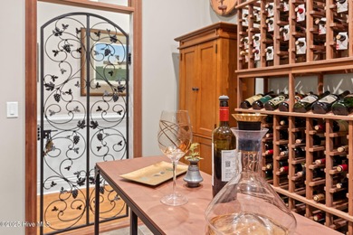 This exceptional home blends timeless Southern charm with on Lockwood Folly Country Club in North Carolina - for sale on GolfHomes.com, golf home, golf lot