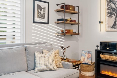 This exceptional home blends timeless Southern charm with on Lockwood Folly Country Club in North Carolina - for sale on GolfHomes.com, golf home, golf lot