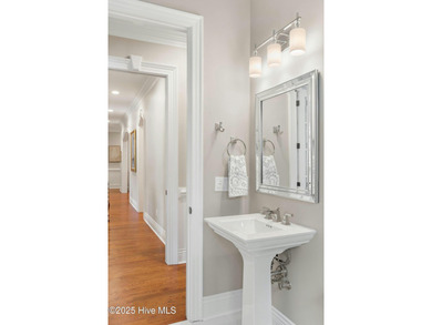 This exceptional home blends timeless Southern charm with on Lockwood Folly Country Club in North Carolina - for sale on GolfHomes.com, golf home, golf lot