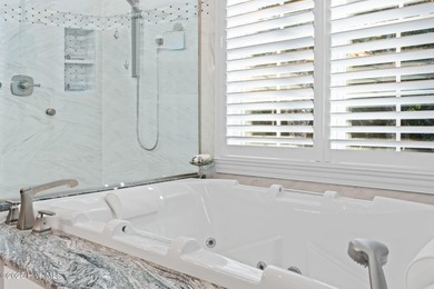 This exceptional home blends timeless Southern charm with on Lockwood Folly Country Club in North Carolina - for sale on GolfHomes.com, golf home, golf lot