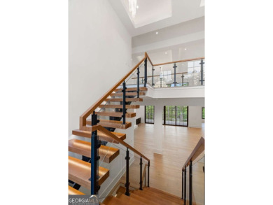 Welcome to your dream home in the prestigious Echelon community on Echelon Golf Club in Georgia - for sale on GolfHomes.com, golf home, golf lot