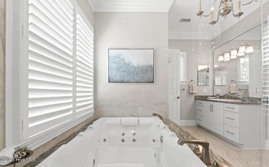 This exceptional home blends timeless Southern charm with on Lockwood Folly Country Club in North Carolina - for sale on GolfHomes.com, golf home, golf lot