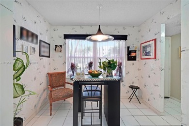RARELY AVAILABLE PORTOFINO MODEL - 1ST FLOOR UNIT IN COVETED on Sunrise Lakes Phase III in Florida - for sale on GolfHomes.com, golf home, golf lot
