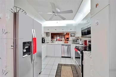 RARELY AVAILABLE PORTOFINO MODEL - 1ST FLOOR UNIT IN COVETED on Sunrise Lakes Phase III in Florida - for sale on GolfHomes.com, golf home, golf lot