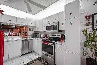 RARELY AVAILABLE PORTOFINO MODEL - 1ST FLOOR UNIT IN COVETED on Sunrise Lakes Phase III in Florida - for sale on GolfHomes.com, golf home, golf lot