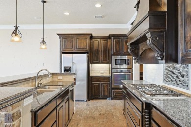 Welcome to this exquisite 5-bedroom, 4-bathroom on The Golf Club at Resort Eagle Mountain Lake in Texas - for sale on GolfHomes.com, golf home, golf lot