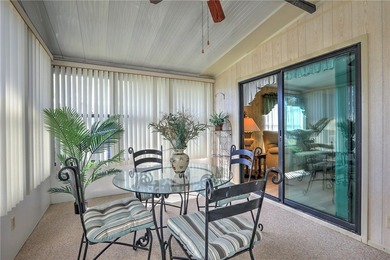 Just a short walk to the golf course, this well-maintained home on Barefoot Bay Golf Course in Florida - for sale on GolfHomes.com, golf home, golf lot