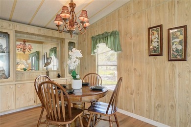 Just a short walk to the golf course, this well-maintained home on Barefoot Bay Golf Course in Florida - for sale on GolfHomes.com, golf home, golf lot