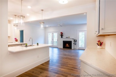 This single-family home offers three bedrooms, two bathrooms on Carolina Trace Country Club in North Carolina - for sale on GolfHomes.com, golf home, golf lot