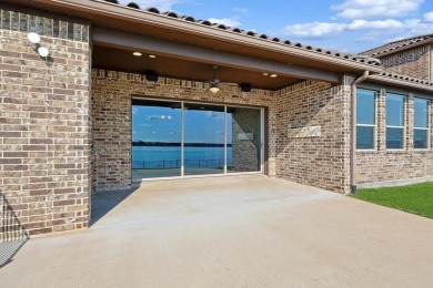 Welcome to this exquisite 5-bedroom, 4-bathroom on The Golf Club at Resort Eagle Mountain Lake in Texas - for sale on GolfHomes.com, golf home, golf lot